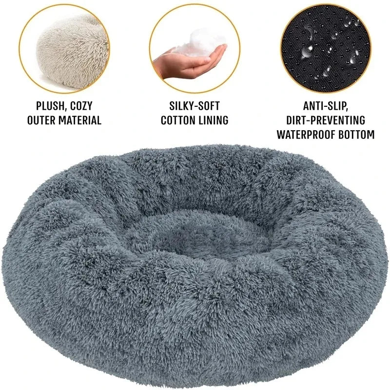 Gray donut pet bed with features highlighted on a white background